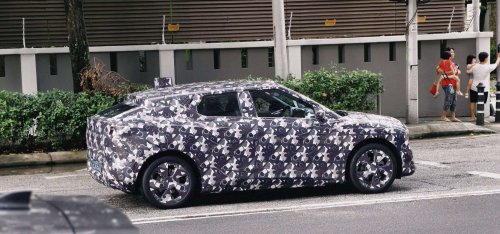 Perodua ‘QV-E’ EV spotted without rear wing, exposing sloping roofline, notched tailgate design, sporty profile