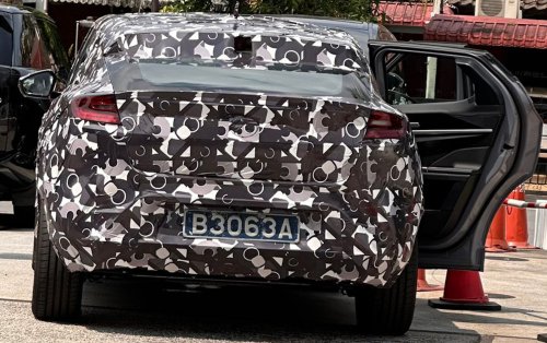 Perodua ‘QV-E’ EV spied again in Malaysia – sloping roofline, small side window revealed; debut in Q4 2025