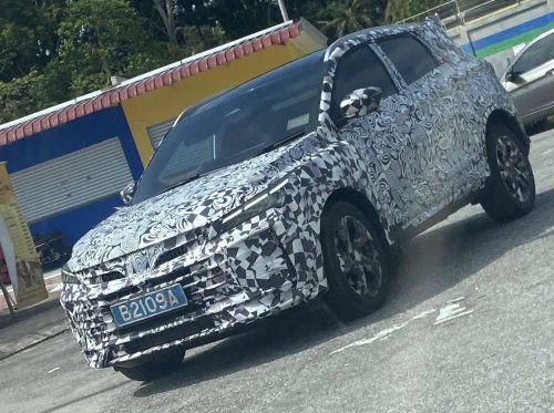 Proton, 2025 Proton X50 facelift spied with reduced front camo revealing clear look of Binyue L inspired face