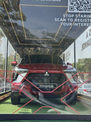 Mitsubishi Xforce spotted again in Malaysia on the back of a roving truck – nationwide tour until March 15