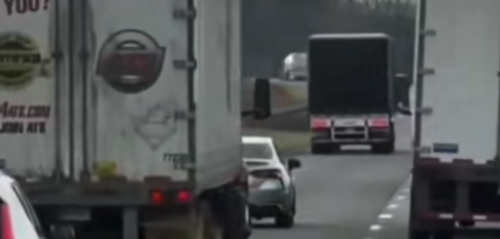 This Mystery Driver Used a Brilliant (and Slightly Unhinged) Move to Clear Trucks From the Passing Lane, and the Internet Is Calling It a Public Service