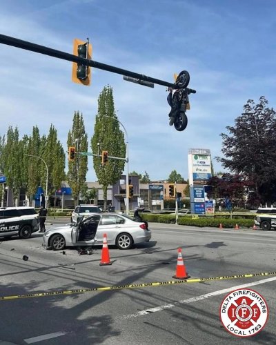 Crash Leaves Sportbike Hanging From Traffic Light in Accidental Trick-Shot Parking Job