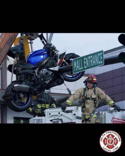 Crash Leaves Sportbike Hanging From Traffic Light in Accidental Trick-Shot Parking Job