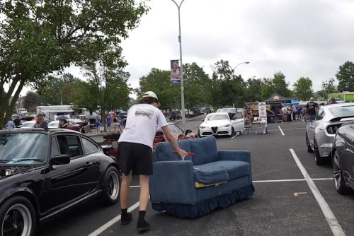 YouTuber Brings a Drivable Couch to a Car Meet, Instantly Enrages Porsche Owner