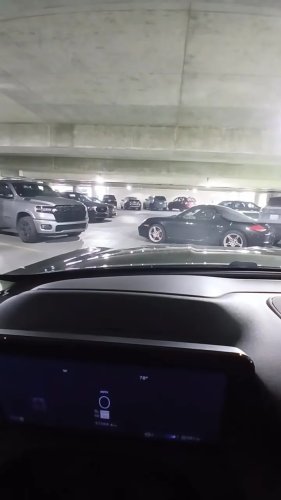 Porsche Rolls Into Parked Car After Owner Apparently Makes Common Parking Mistake