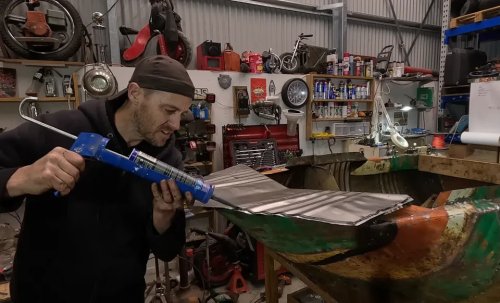 YouTuber Builds a Working River Boat out of Scrap Oil Drums—and Actually Takes It on the Water