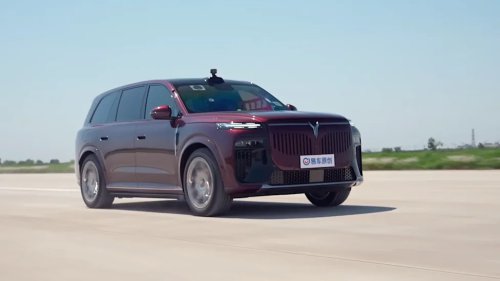Watch: 6,000-lb Chinese Luxury EV Jumps Off a Mega Ramp and Survives
