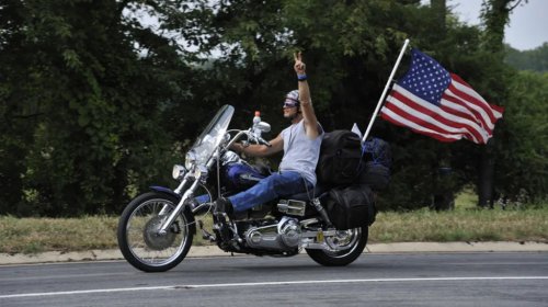 Who Invented The Biker Wave? It Was (Probably) This Iconic Motorcycle Duo