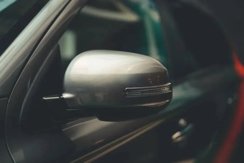 The Little Tab Under Your Rearview Mirror Most Drivers Never Use