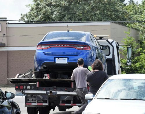 Watch A Panamera Owner Ripped His Own Bumper Off Fighting a Glendale Tow Truck — And Still Lost the Car