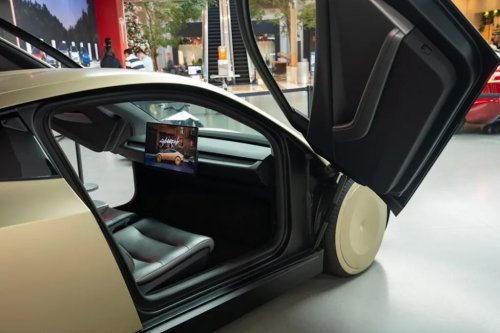 Elon Musk, Robotaxi, Elon Musk Says ‘Pretty Much’ After Meme Mocks Waymo’s Sensor-Packed Robotaxi, as Self-Driving Rivalry Heats Up