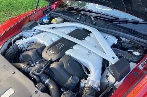 I arrived in the UK with a bike – now I own a £225k Aston