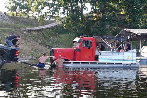 YouTubers Drop a Semi-Truck Cab on a $3,000 Pontoon—And Almost Sink It