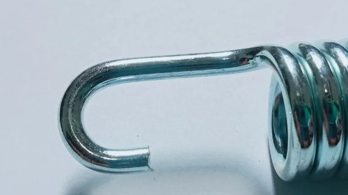 What Are The Springs On Motorcycle Exhausts For?
