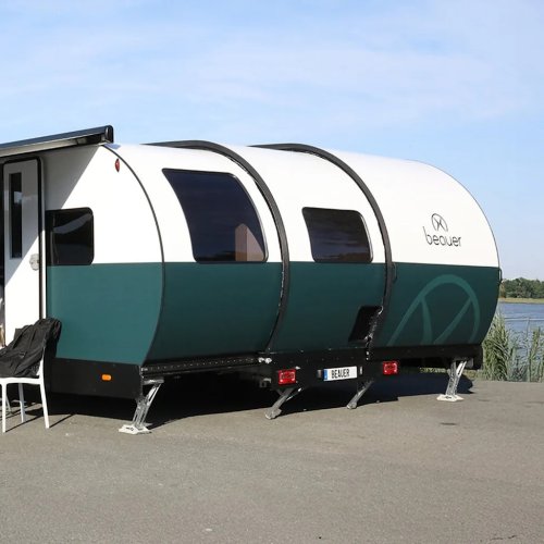 This Clever Expanding Camper Trailer Triples Its Size to Make Room for 8