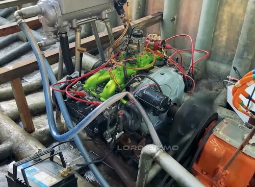 He Built a Full-Size Boat in His Yard—and Powered It With a Custom Hybrid Car Engine