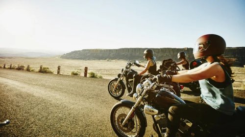 What It Means When You See A Biker Point To Their Fuel Tank