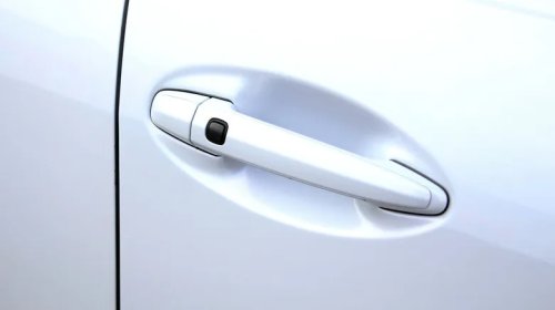 What Is That Little Button On Your Car Door Handle For?