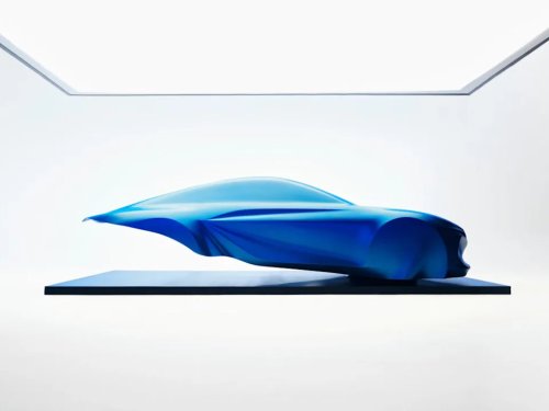 Alpine, Alpine's Next A110 Arrived in Paris as a Draped Sculpture, and Its 2026 Electric Deadline Is Three Months Out