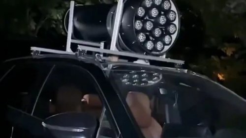 This Driver Got Tired of High Beams. So, He Mounted a Stadium Searchlight on His Roof