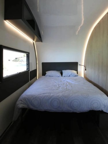 This Clever Expanding Camper Trailer Triples Its Size to Make Room for 8