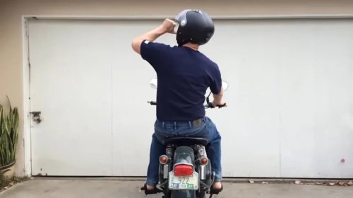 Here's What It Means When You See A Biker Point Their Thumb At Their Helmet