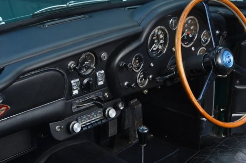 Driving a unique Aston Martin DB4 owned by Tadek Marek