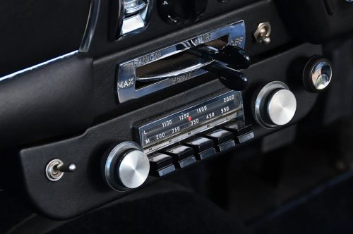 Driving a unique Aston Martin DB4 owned by Tadek Marek