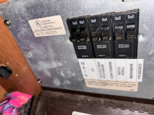 RV owner loses AC, outlets, and microwave on generator, and the fix came down to a transfer switch