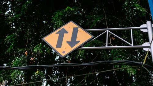 What Does A Road Sign With Two Arrows Mean? (One Pointing Up, The Other Down)