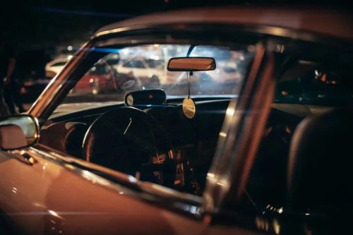 The Little Tab Under Your Rearview Mirror Most Drivers Never Use