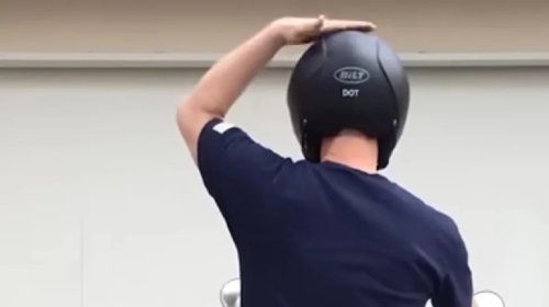 What Does It Mean When A Motorcyclist Taps The Top Of Their Helmet?