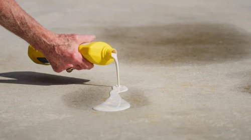 Here Are Some Unexpected DIY Ways To Get Oil Stains Out Of Your Driveway