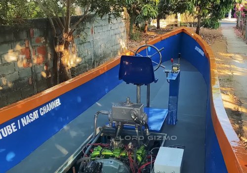 He Built a Full-Size Boat in His Yard—and Powered It With a Custom Hybrid Car Engine