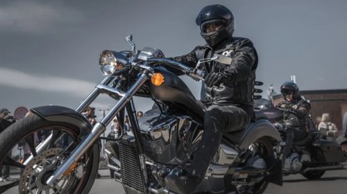 What Does It Mean When A Biker Has Their Left Palm Facing Up And Swings It Upwards?