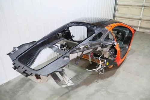 McLaren, Someone Crashed a McLaren GT, So Why Not Buy the Carbon Fiber Shell and Turn It Into a Race Car Bed?