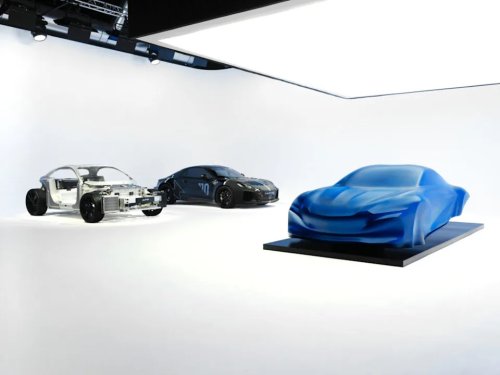 Alpine, Alpine's Next A110 Arrived in Paris as a Draped Sculpture, and Its 2026 Electric Deadline Is Three Months Out