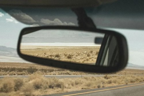 The Little Tab Under Your Rearview Mirror Most Drivers Never Use