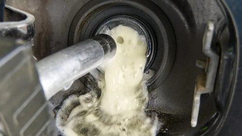 Topping Off Your Gas Tank Is A Huge Mistake - Here's Why