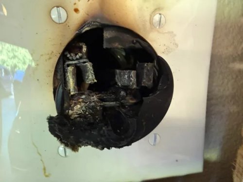 Electrician inspects melted EV charger outlet, says cheap 50-amp receptacles take the blame