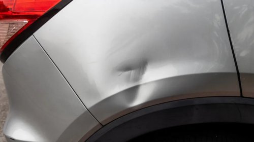 Can You Really Fix Car Dents With Cheap Cans Of Compressed Air? (And Should You?)
