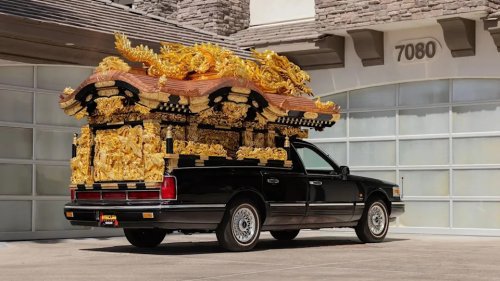This Lincoln Town Car Hearse Has A Massive Golden Dragon On Its Roof... And It Could Be Yours
