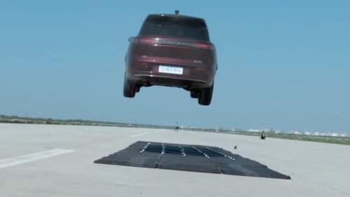 Watch: 6,000-lb Chinese Luxury EV Jumps Off a Mega Ramp and Survives