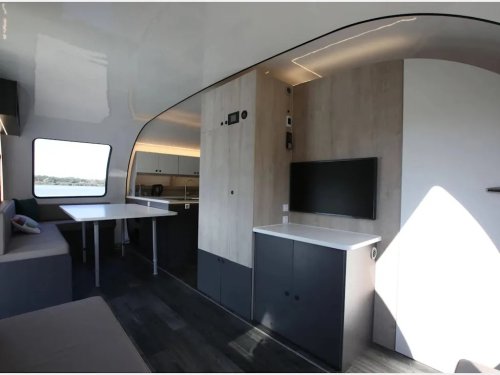 This Clever Expanding Camper Trailer Triples Its Size to Make Room for 8