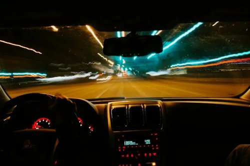 The Little Tab Under Your Rearview Mirror Most Drivers Never Use
