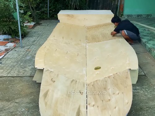 He Built a Full-Size Boat in His Yard—and Powered It With a Custom Hybrid Car Engine