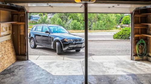 The Lifehack That'll Save Your SUV's Trunk From Bouncing Off The Garage Door
