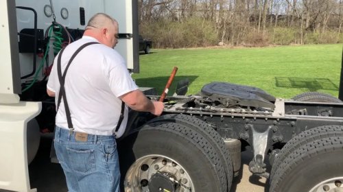 Why Do Truckers Hit Their Tires? Tire Thumping, Explained