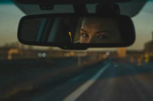 The Little Tab Under Your Rearview Mirror Most Drivers Never Use