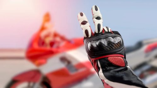 What It Means When You See A Biker Point To Their Fuel Tank